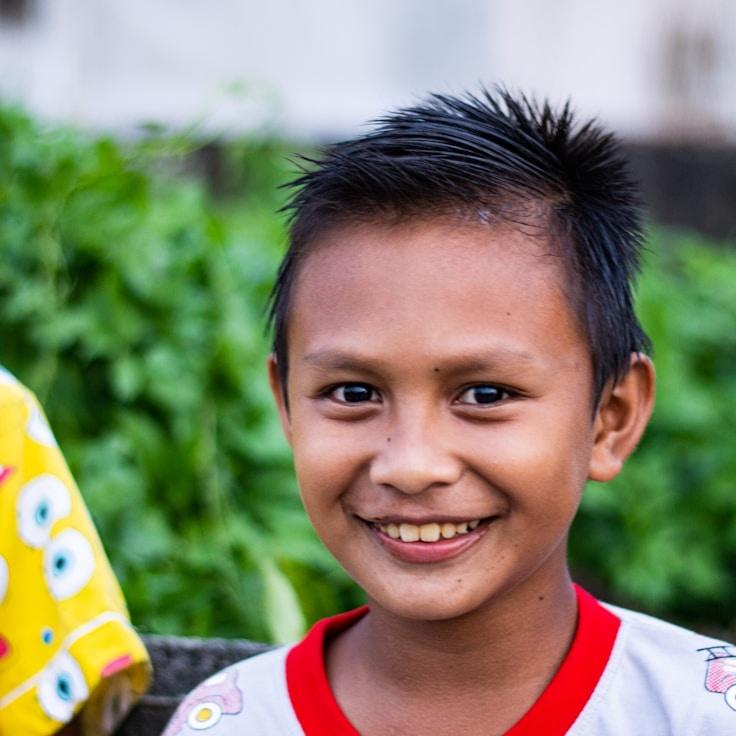 Asha Rao, Lead Design Curator at Luminex Finance Core, reviewing corporate floral arrangements