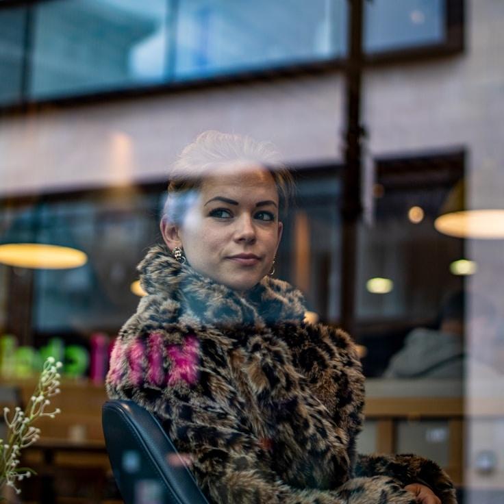 Leo Chen, Client Relations Director, discussing corporate gifting strategy with business clients